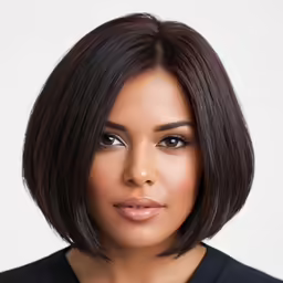 a black woman with a shoulder length bob haircut