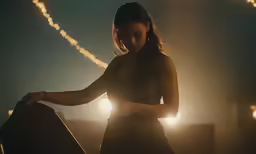 a person holding a box in their hands