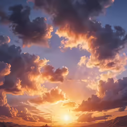 the sun rises behind a cloud filled sky