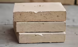 a stack of three rectangular bricks sitting on top of a table