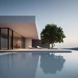 the exterior of a house with a tree in the foreground