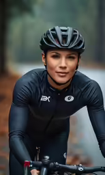the cyclist poses for a portrait while riding her bike