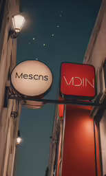 a couple of neon signs are attached to the side of a building