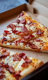 there are two slices of pizza in a box