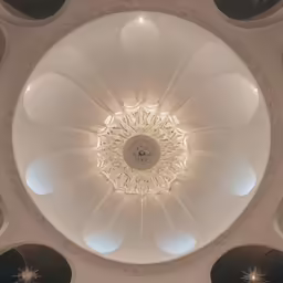 an architectural design featuring circular ceiling lights