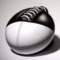 a football ball on top of white table
