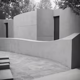 a man skateboarding next to a concrete structure