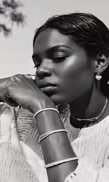a woman is looking off to the side