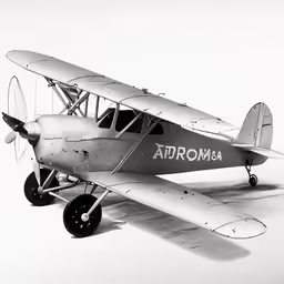a small plane in black and white with a word on it