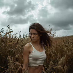 the girl in the field is wearing underwear