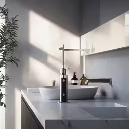 a bathroom has two sinks and a mirror