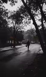 a man walking down the middle of the street