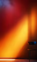 a chair that is next to a wall