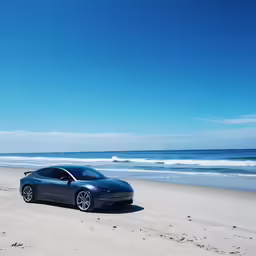 the grey car is parked on the beach