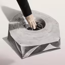 a person using a black and white photo as a display stand