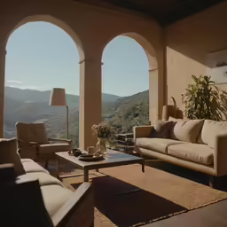 a living room is adorned with arch style windows