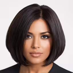 a woman with brown hair is wearing a black shirt