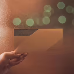 a person holding a blank piece of paper