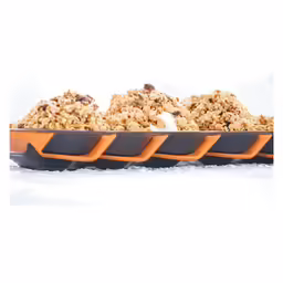 four serving plates filled with dessert like foods