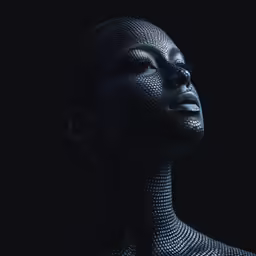 an abstract woman with dark makeup and silver foil