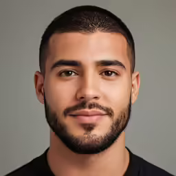 an egyptian male with a beard and black shirt