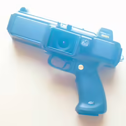 a small blue gun with the body tilted slightly in front of it