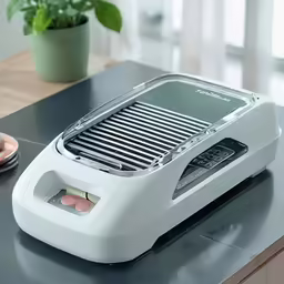 a small machine that is sitting on the counter