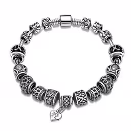 a bracelet with charms and hearts in the middle,a bracelet with charms that have a heart