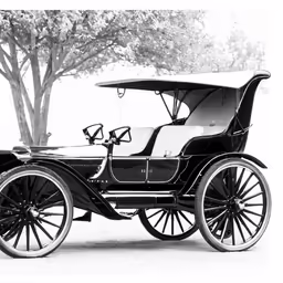 black and white photograph of an old style car