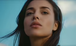 a close up of a woman with dark hair