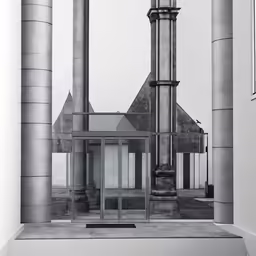 the building is very large in size, with its tall pillars and roof