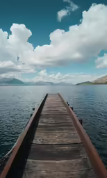 an overhanged pier extends to the lake