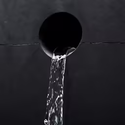 there is water coming out of a pipe