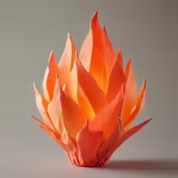 a red vase sitting on top of a table