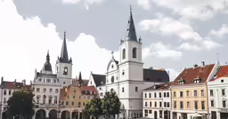 the buildings are white and brown in color