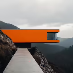 there is a large building with orange paint on it