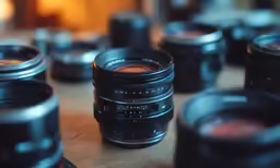 various cameras sitting on top of each other
