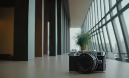 the camera has been placed near a wall of glass