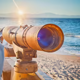close up of a binoc pointed at the sun