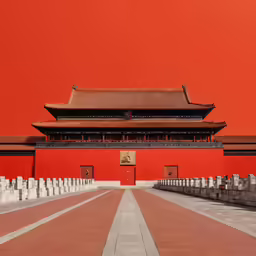 a chinese building with a orange sky in the background