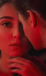 two women with their noses near one another