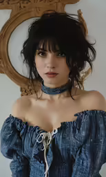 an attractive lady is posing for the camera
