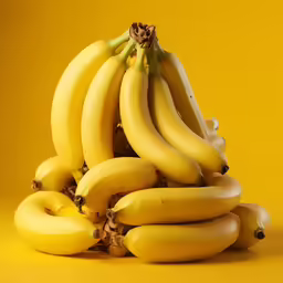 a bunch of bananas sitting on top of each other
