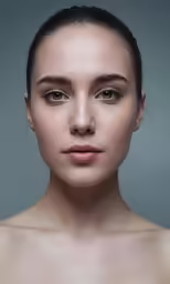 a woman with her eyes slightly closed and her face tilted