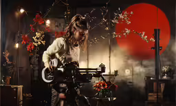 the woman is in front of a sewing machine