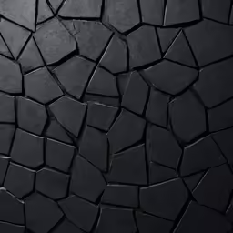 a very dark abstract photograph of black stones