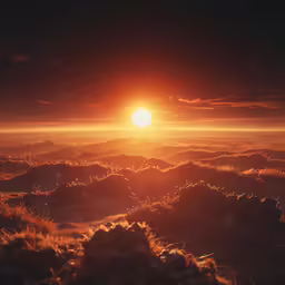 a sunset over the mountains as viewed from above