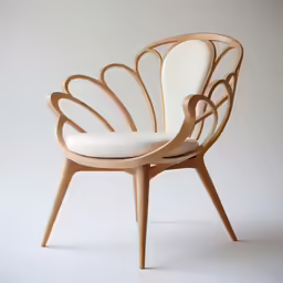 the white upholstered chair is designed to resemble a bird