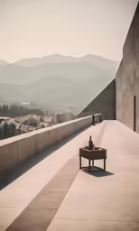 the bench on the ground overlooking the mountains and houses