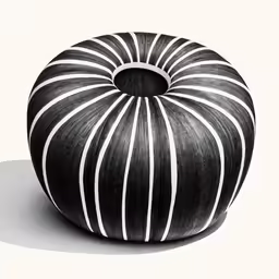 an black and white drawing of a black and white striped apple